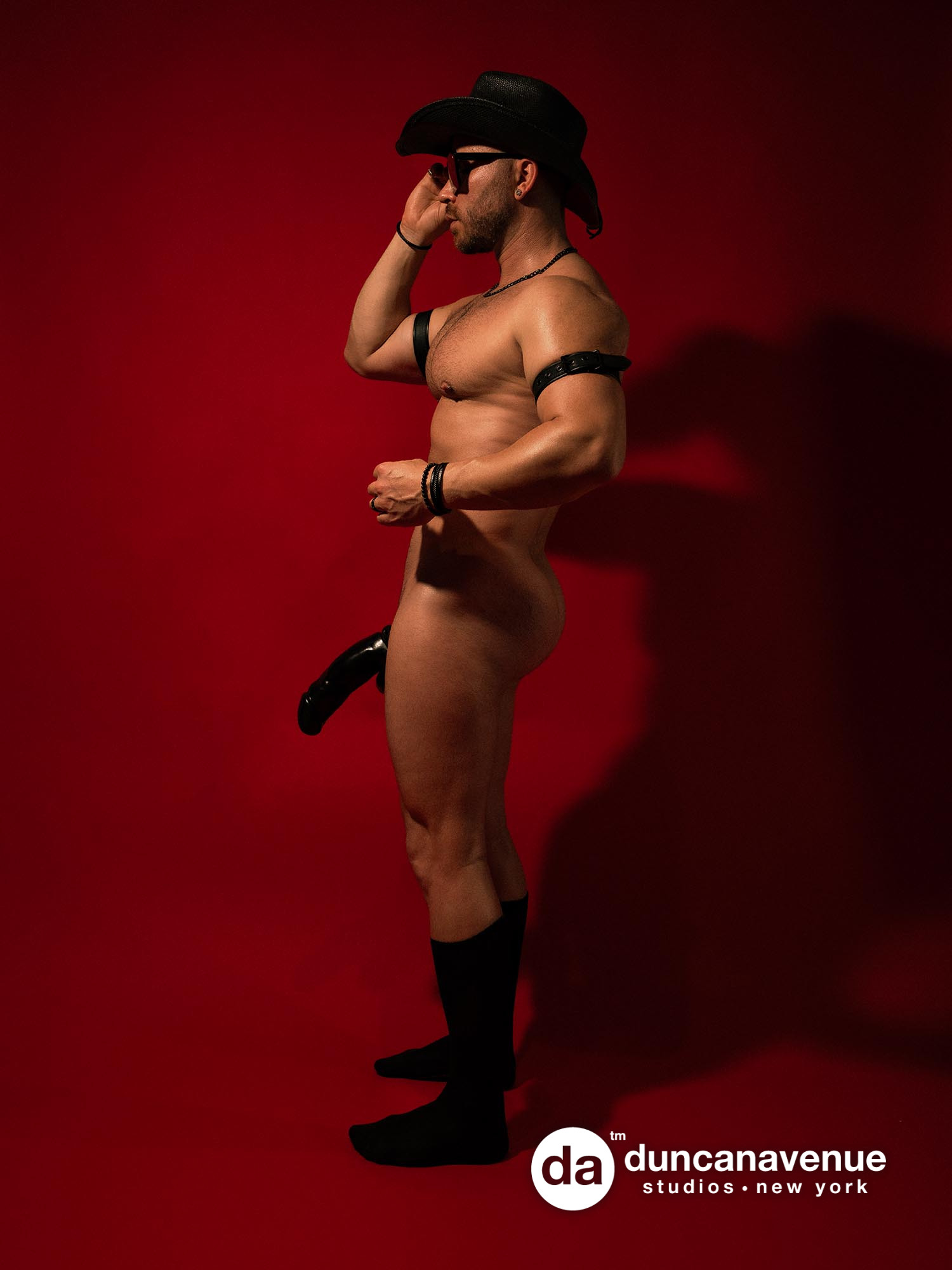 Cocky Cowboy – Empowering Male Boudoir: Capturing the Essence of Authenticity in Nude and Homoerotic Photography – NYC Mae Boudoir Experience – The Best Men's Boudoir in New York City
