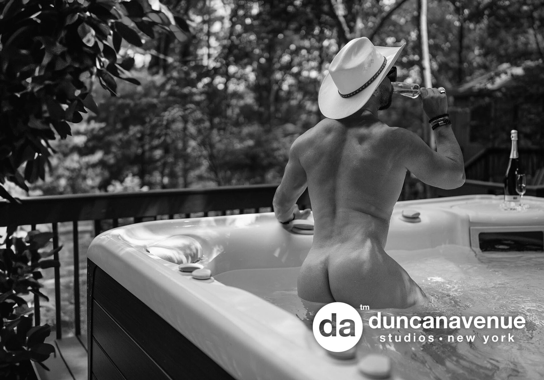 Sultry Springs: Cocky Cowboy's Hot Tub Hijinks – A Dive into the Depths of Fine Art Male Boudoir Photography – Presented by HARD NEW YORK – Homoerotic Art Gallery